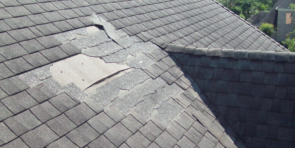 Damaged roof caused by a storm in Lake County